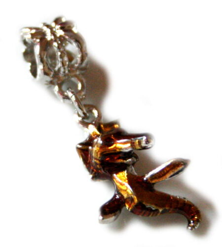 Gold coloured cloisonne seahorse pendant. Silver base colour-0
