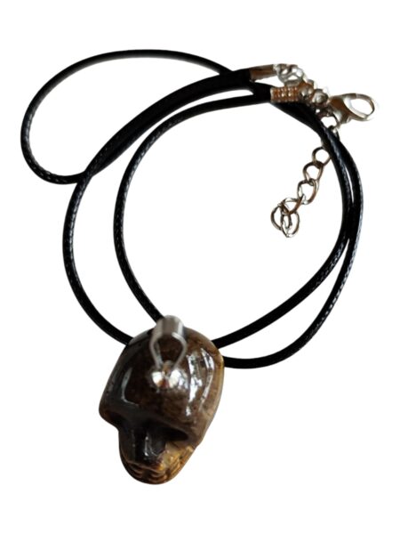 Tiger Eye skull pendant on black sting, 45cm