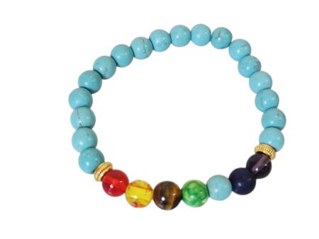 Blue Howlite with chakra bracelet with two gold spacers, stretch cord