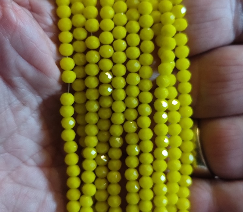 Glass bead string, faceted, rondelle, 3x4mm, Non Translucent Lemon Yellow, 40cm - Image 2