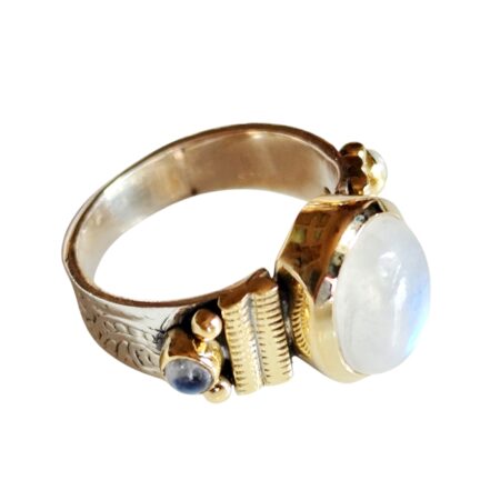 Oval cut moonstone cabochon with two small round cabochons ring with bezel setting set in 925 silver, size 7