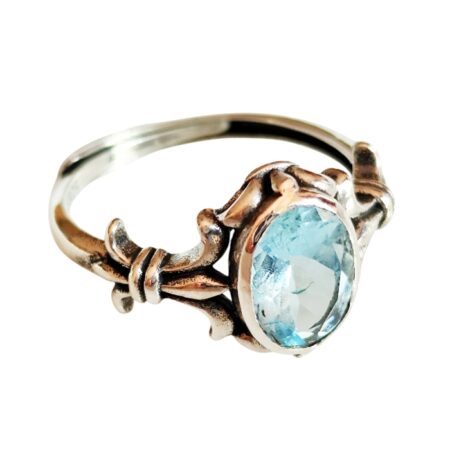 Aquamarine Oval cut stone bezel set ring with fleur-de-lis design in 925 silver, adjustable