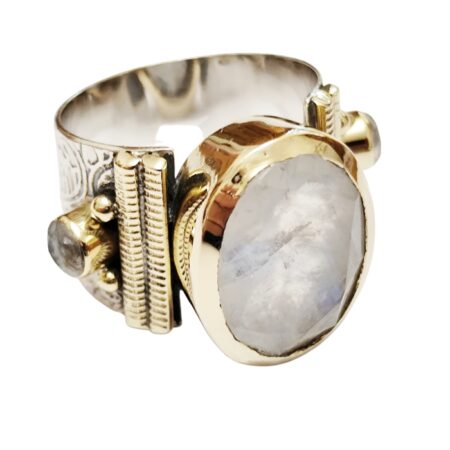 Oval cut Moonstone with two small round cut Moonstones on either side of the ring with bezel setting set in 925 silver, size 7