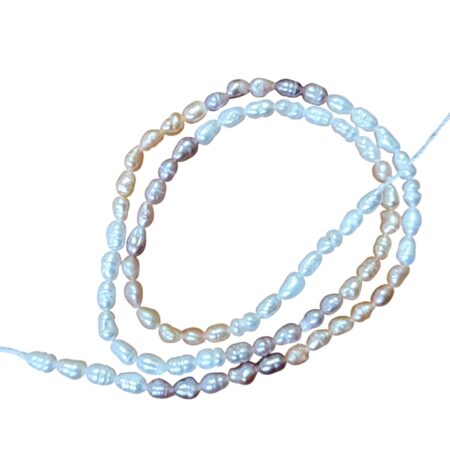 Freshwater rice shaped pearl string, white with peach and lilac gradient, 36cm length of strand, 3.1-3.4mm diameter